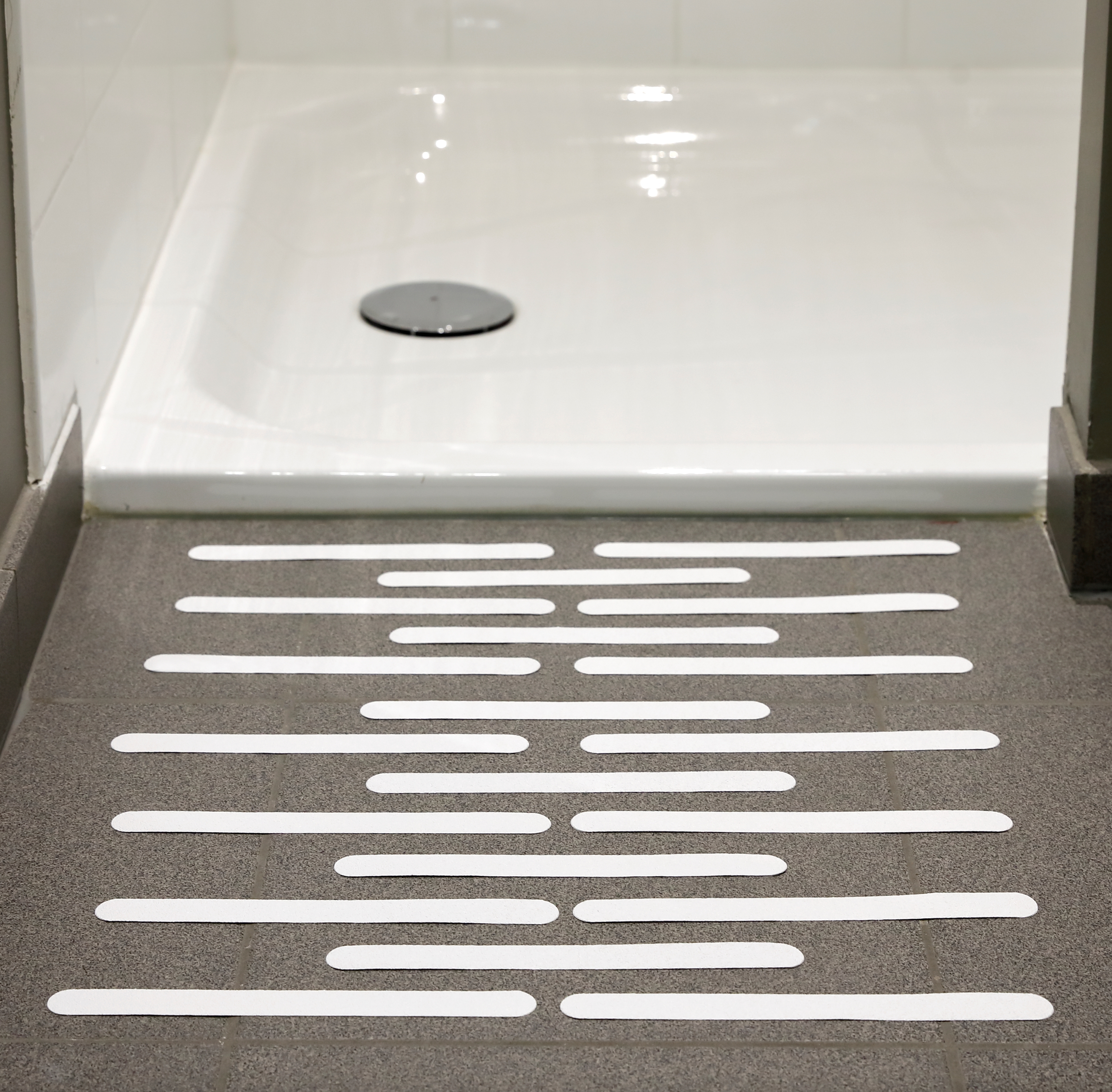 Veiligheidsstrips voor bad, douche en badkamer 21,6 x 1,9 cm (per 20) -- A830600